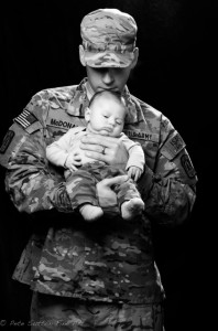 Sutton took this photo of a soldier and his baby just prior to his deployment. 