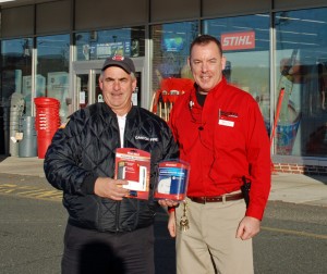 Fire Lt. Don Lester and Rocky’s Ace Hardware Manager Randy Davis