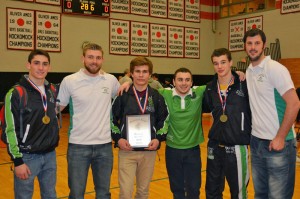 Rob DiCalogero, Chris Sullivan and Quinn Merrigan pose with their Hock championship medals. (CHS Athletics photo)