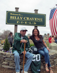 Billy Cravens and his wife, Rosey, at the official unveiling of “Billy Cravens Field” at the Luce School in April (Kim White photo)